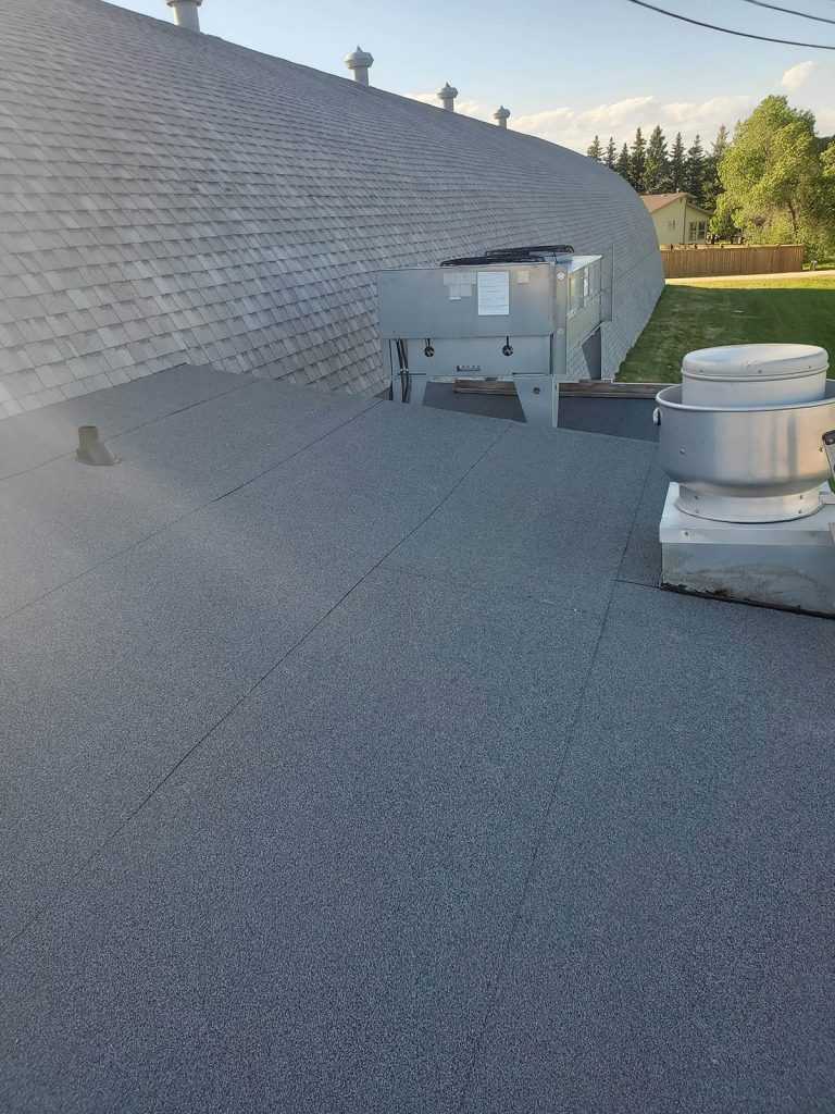 rounded roof curling rink roofing project asphalt shingles repair and replace