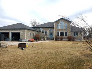Large garage and home shingles and roofing project winnipeg
