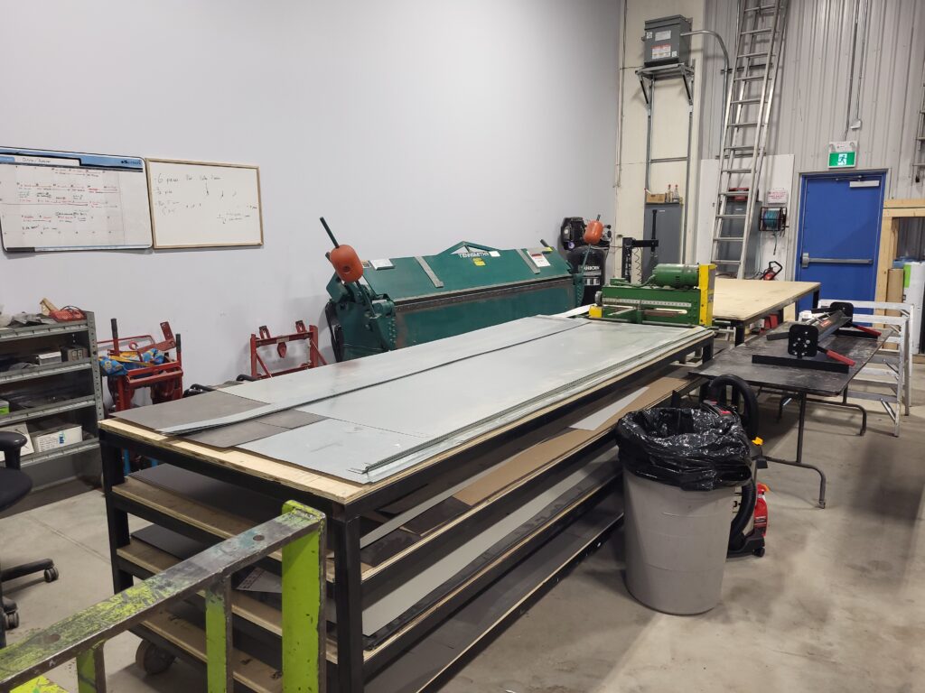 in-house metal fabrication shop for roofing components.